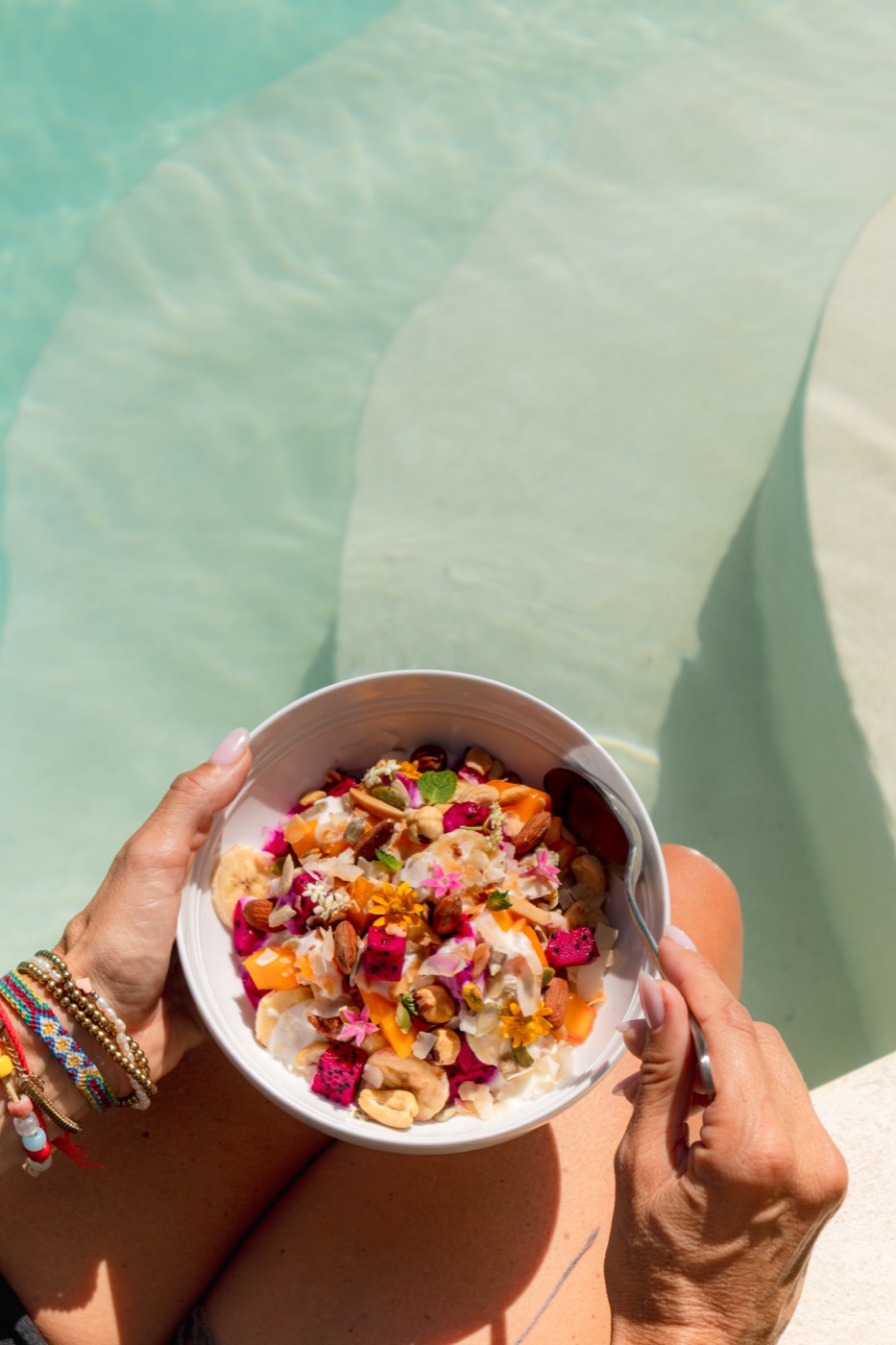 Fruit bowl breakfast held over the pool steps
