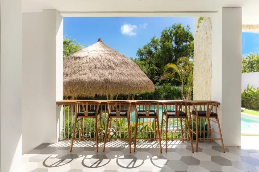 Bar seats overlooking the pool